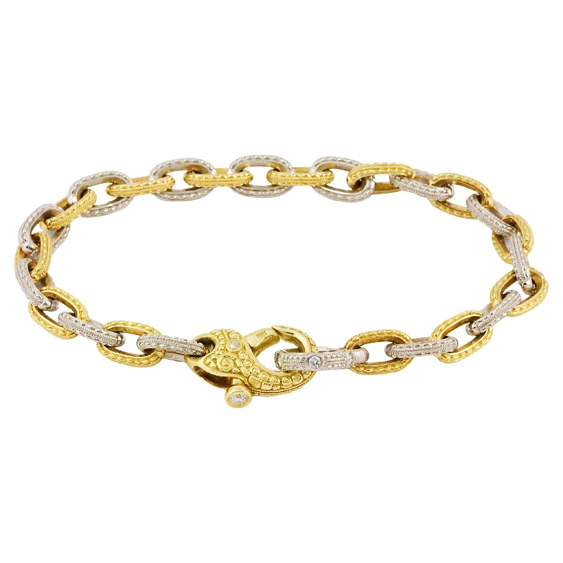 ALEX SEPKUS PLATINUM AND 18K YELLOW GOLD VICTORIAN CABLE BRACELET