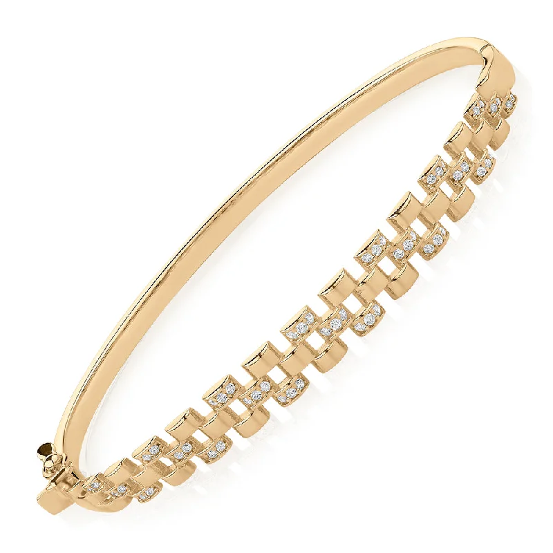 Round Brilliant bangle with diamond simulants in 10 carat yellow gold