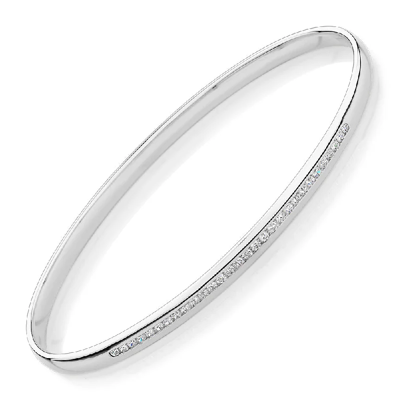 Oval bangle with 0.45 carats* of diamond simulants in 10 carat white gold